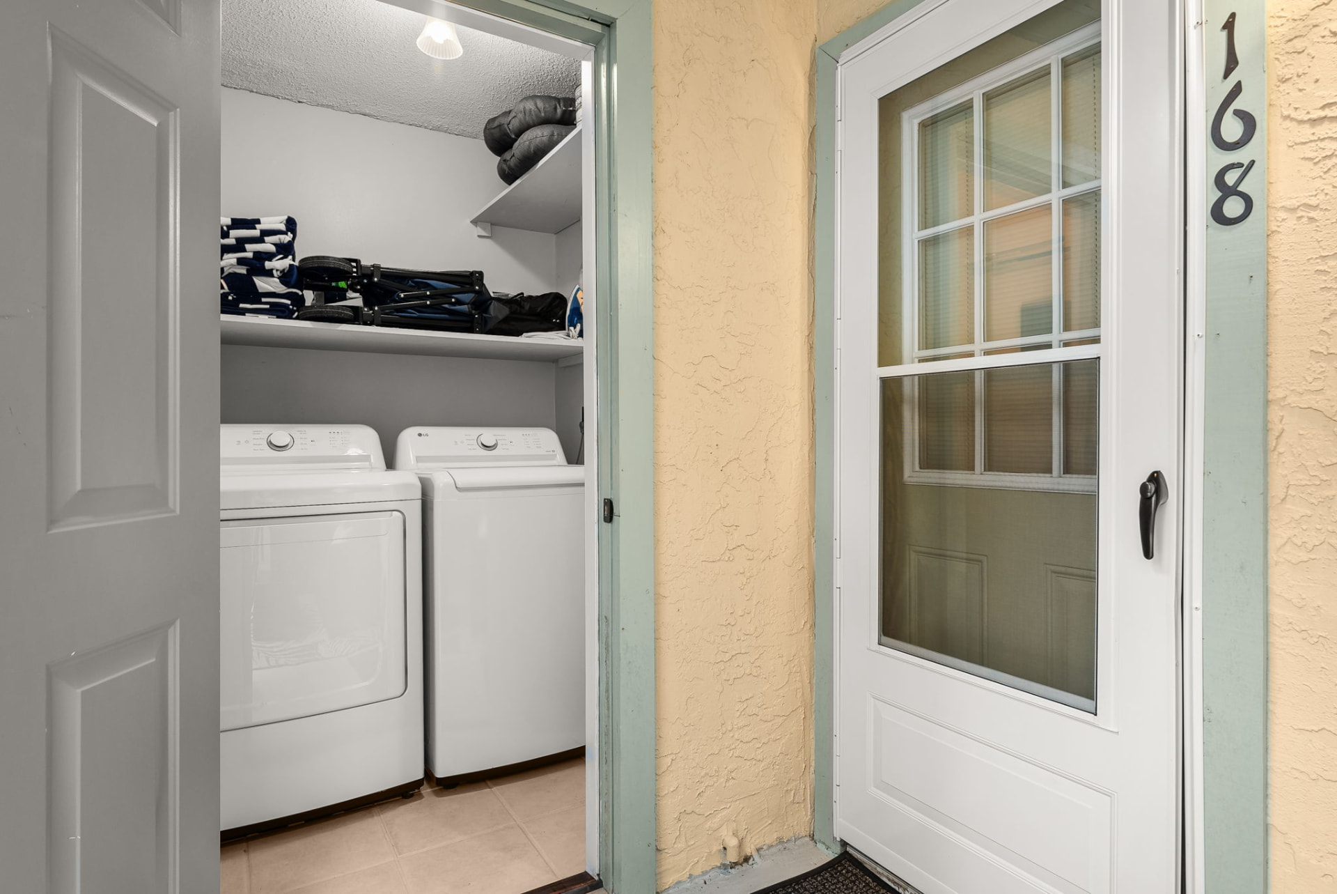 In-unit laundry with beach gear for guests
