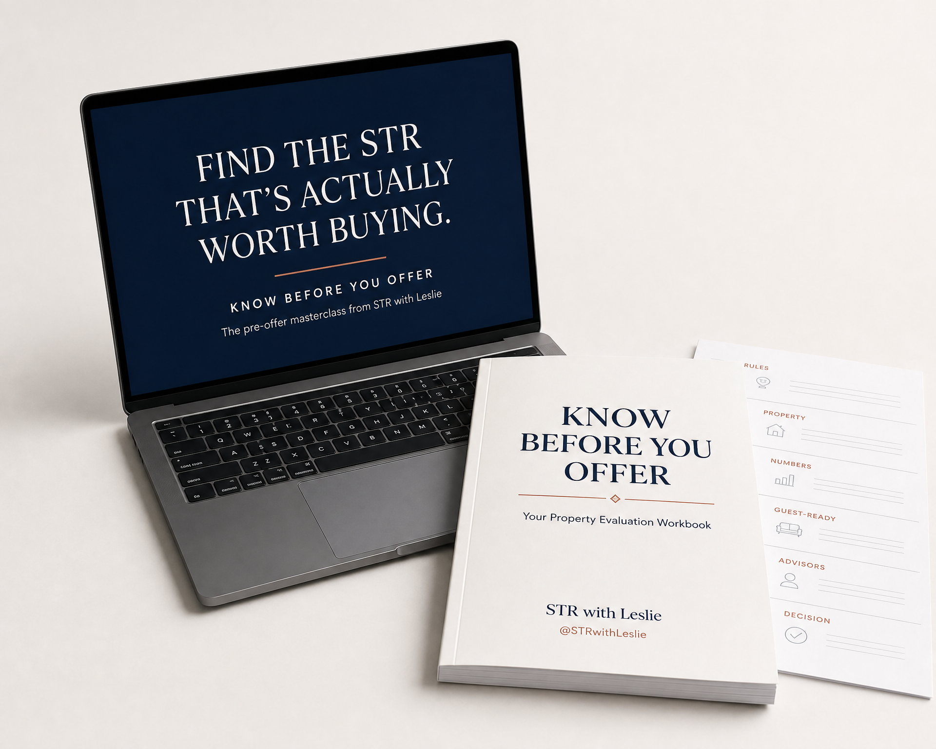 Know Before You Offer masterclass on a laptop beside the printed Property Evaluation Workbook